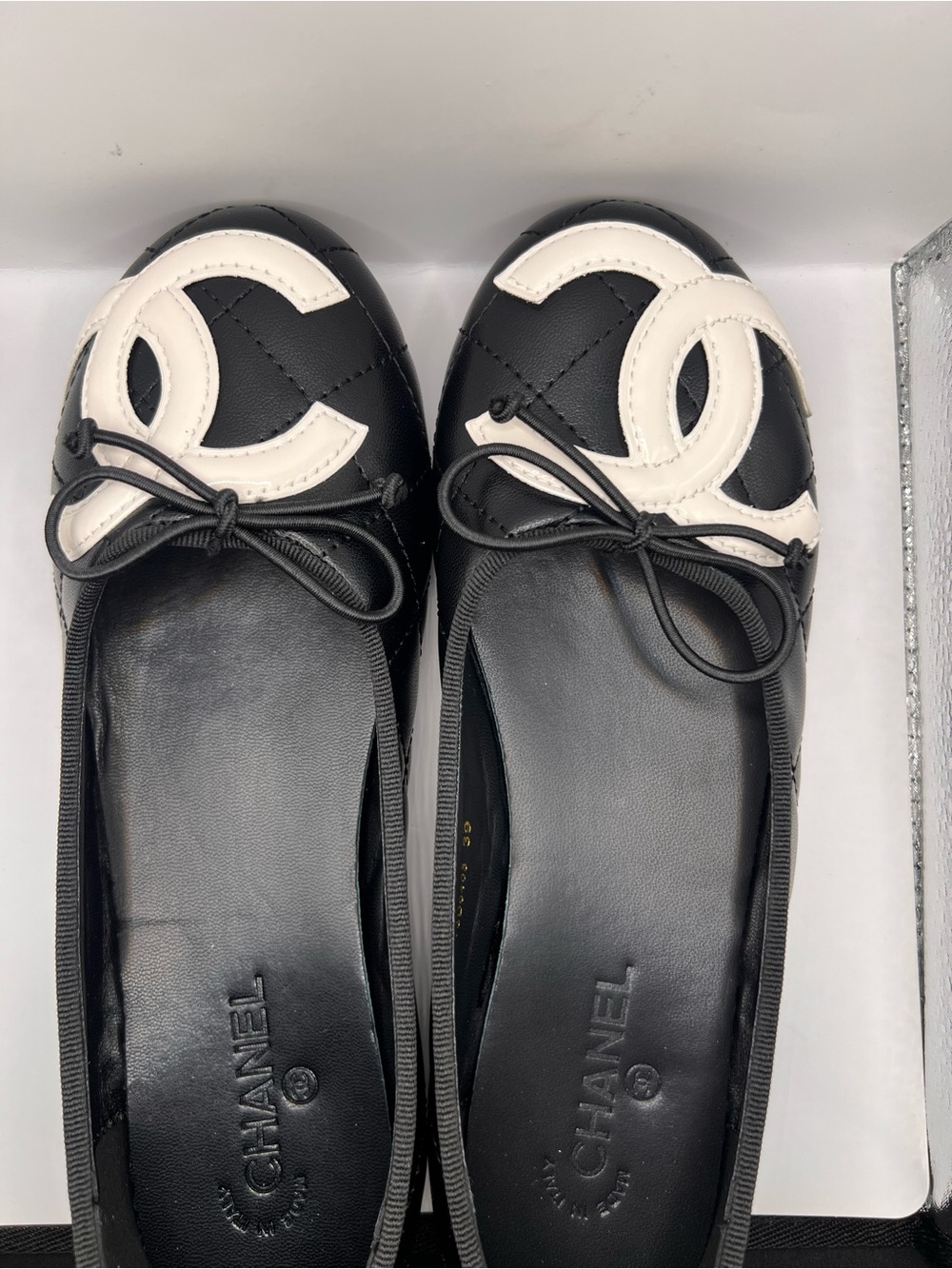 CHANEL Black & White Quilted Leather CC Ballet Flats with Bow